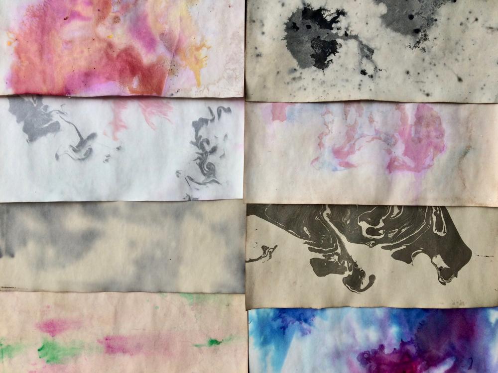 Multiple ink stained paper