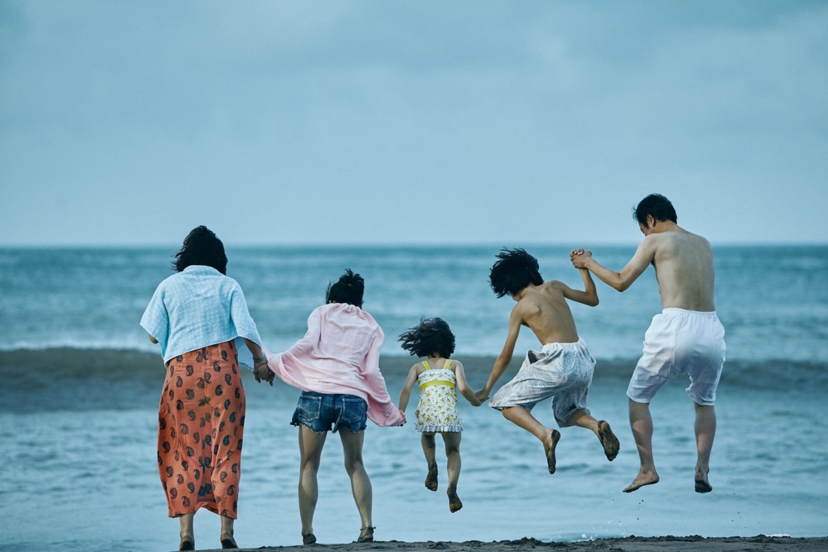 Film still: showing the Shibata family at the seaside