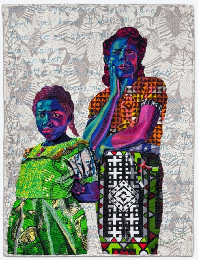 Textile Image: A mother and a daughter look directly out of the canvas, the little girl has her hands behind her back and is wearing a green dress, while the mother has one hand across her waist while the other hand is to her chin.