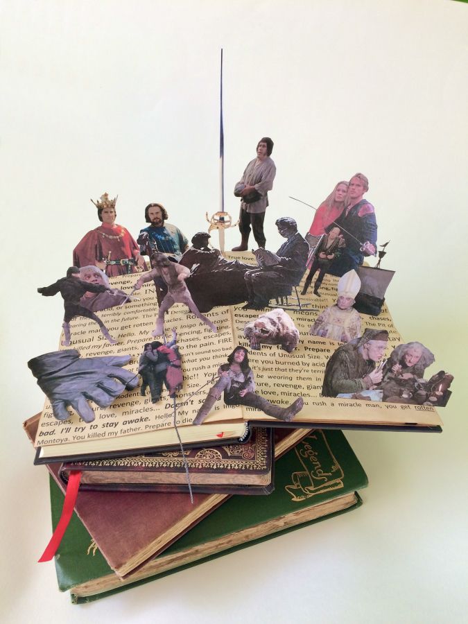 Photograph of an open book revealing pop-up characters from the film