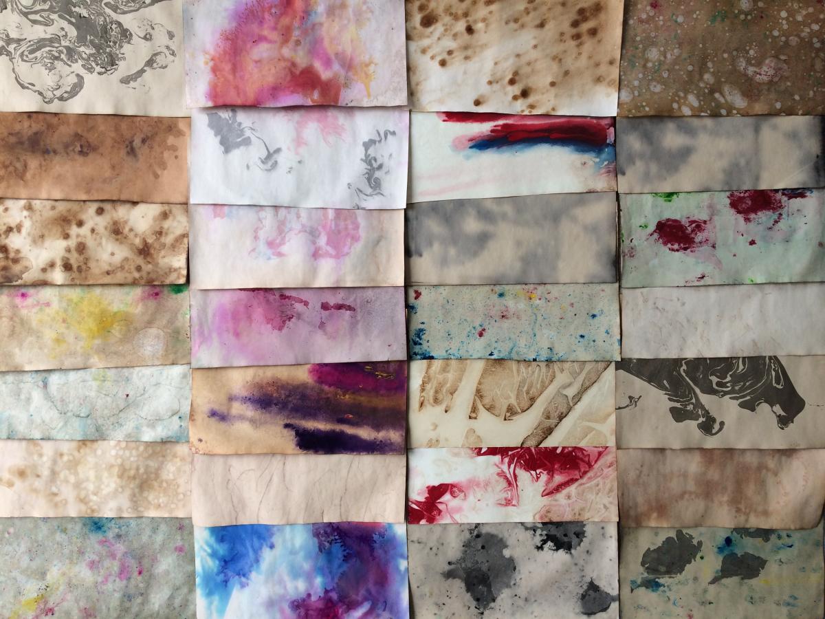 28 differently stained pieces of paper