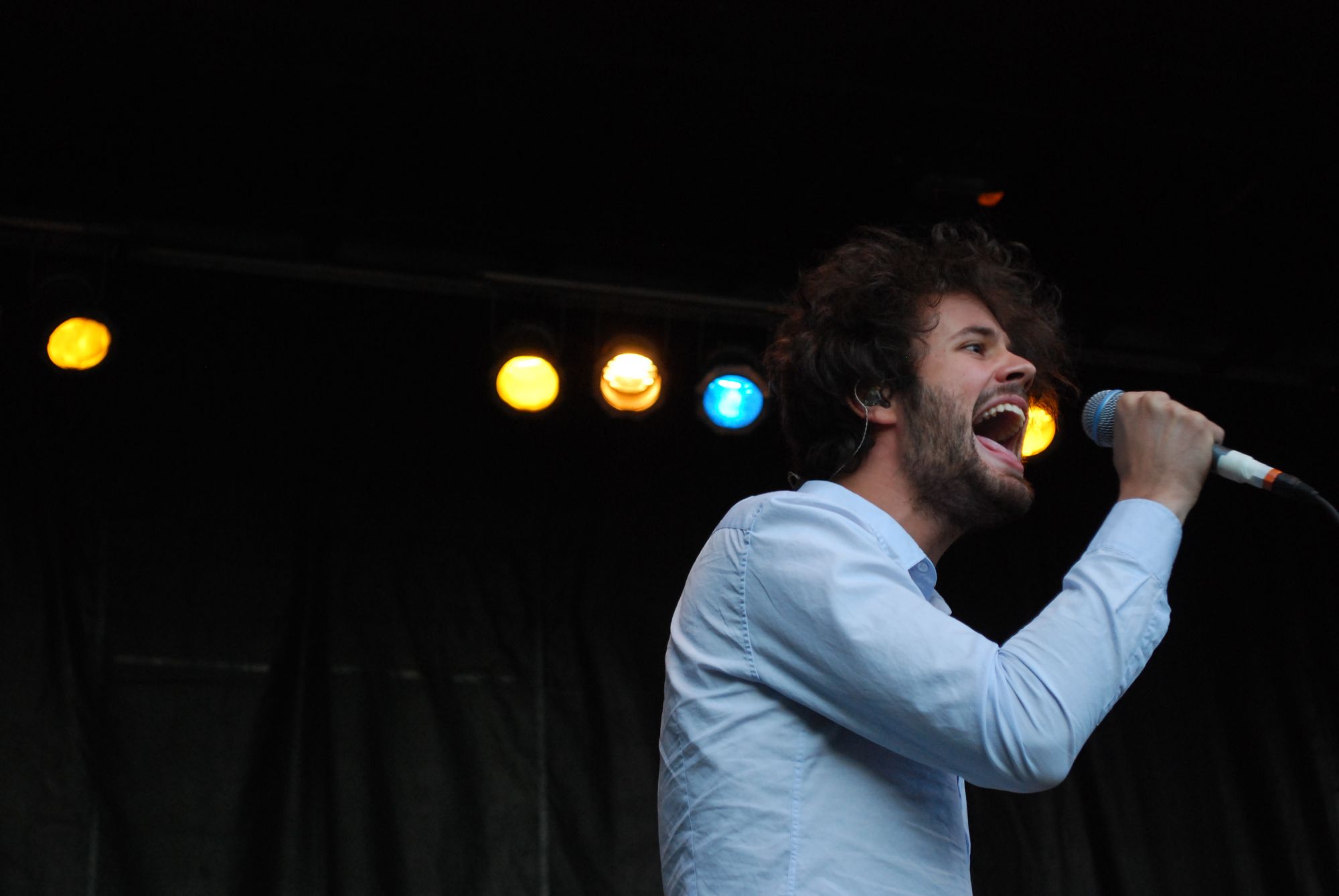 Photograph of frontman, Michael Angelakos performing