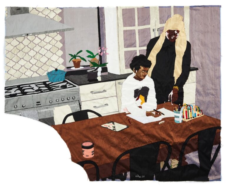 .Fiber art: Shows the artist and her child looking at paper/drawing/homework on the kitchen table
