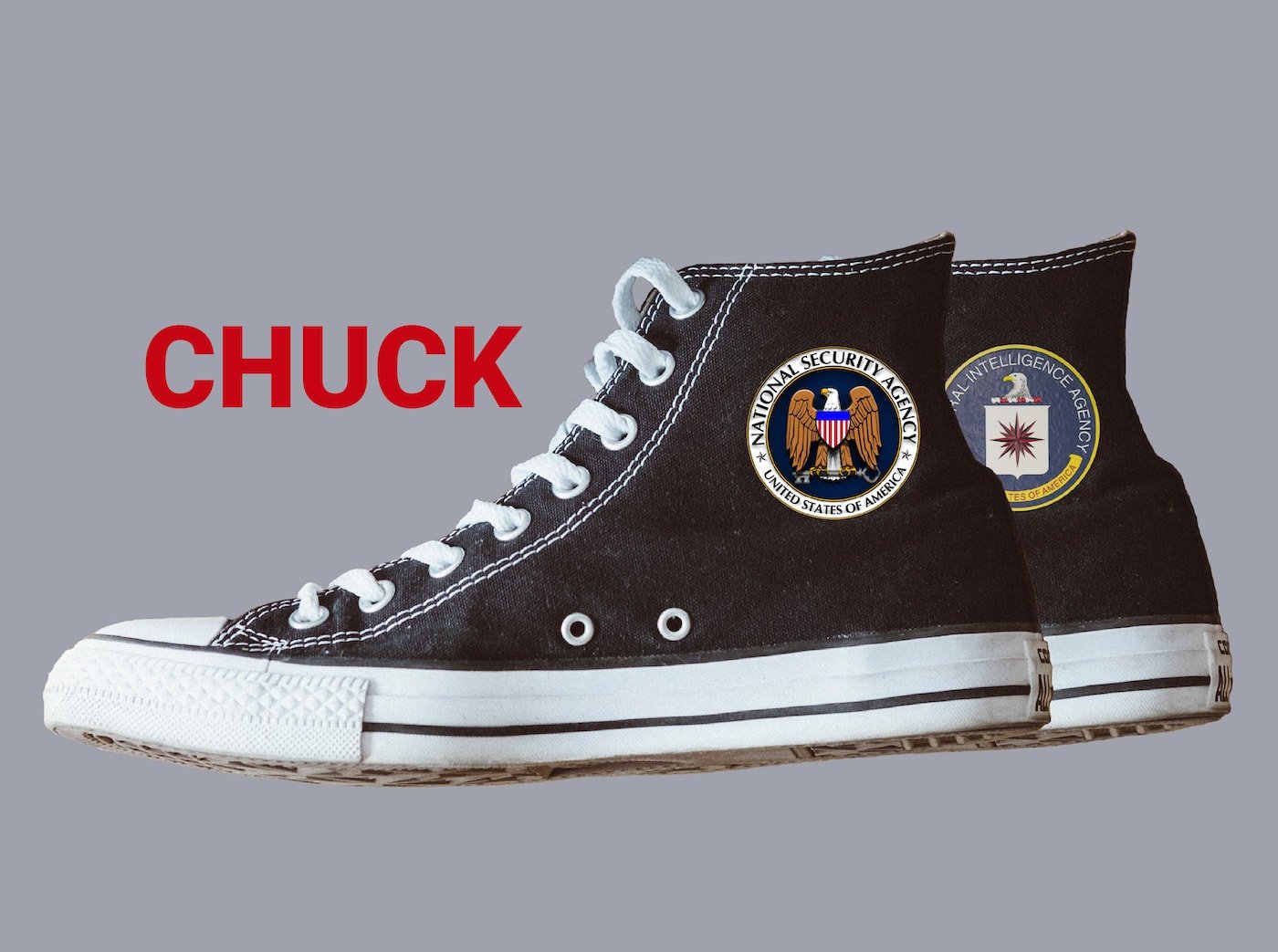 A pair of van-type sneakers - the labels replaced with FBI and CIA logos