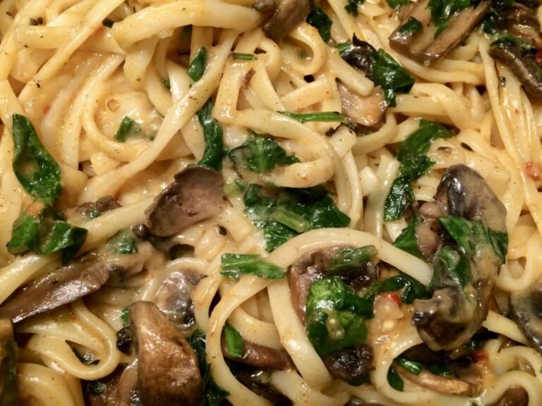 Close-up photograph showing the three mushroom pasta.