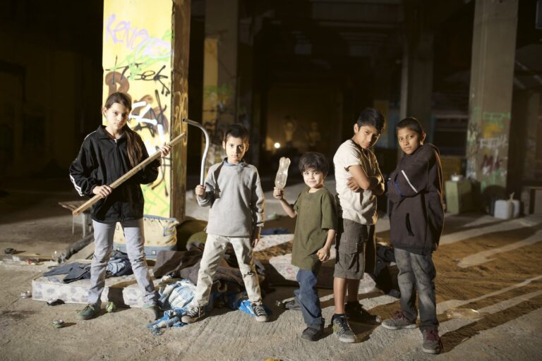 Photo: The group of children stand armed ready to protect themselves